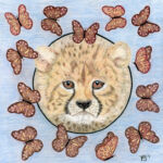 Young cheeta with butterflies